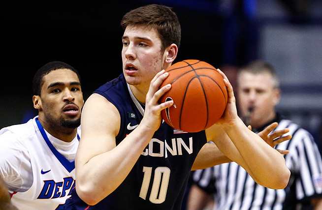 UConn's Tyler Olander was suspended indefinitely after facing multiple charges, including drunken driving. 